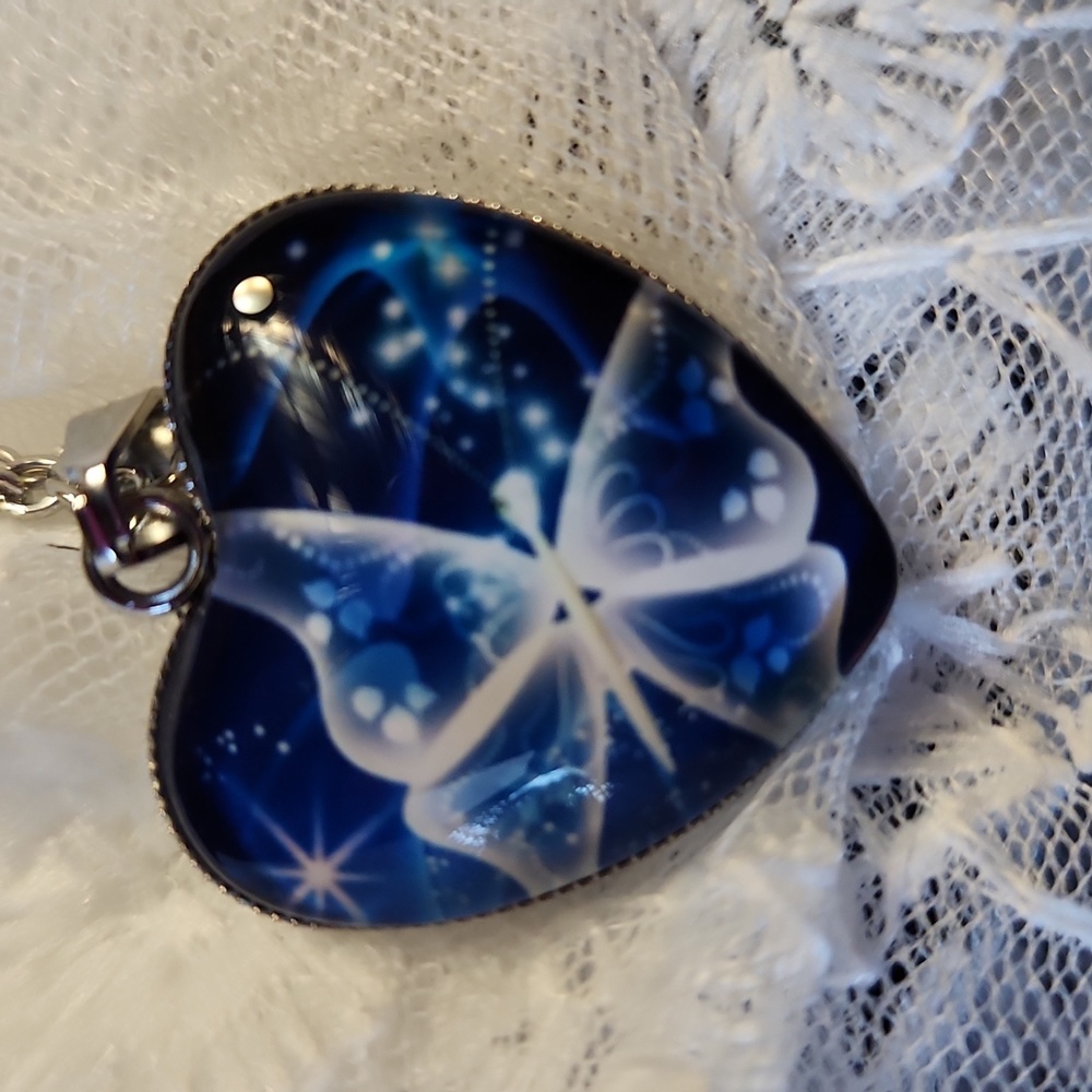 Blue butterfly 🦋 heart ❤️ necklace.